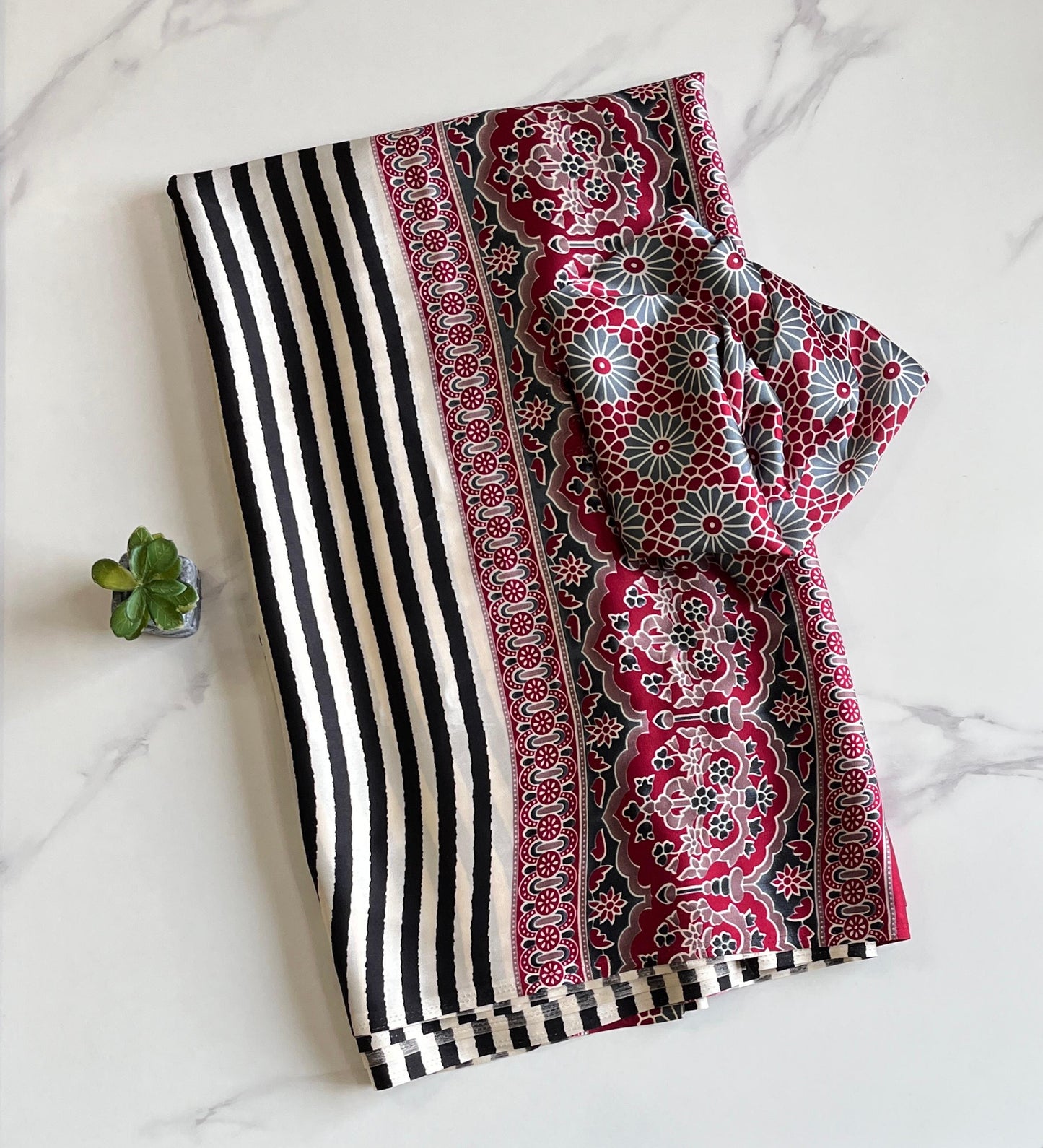 Soft and flowy crepe silk saree with stripes and ajrakh pallu