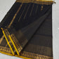 Beautiful black pure kanchi cotton saree with zari stripes and small mango border