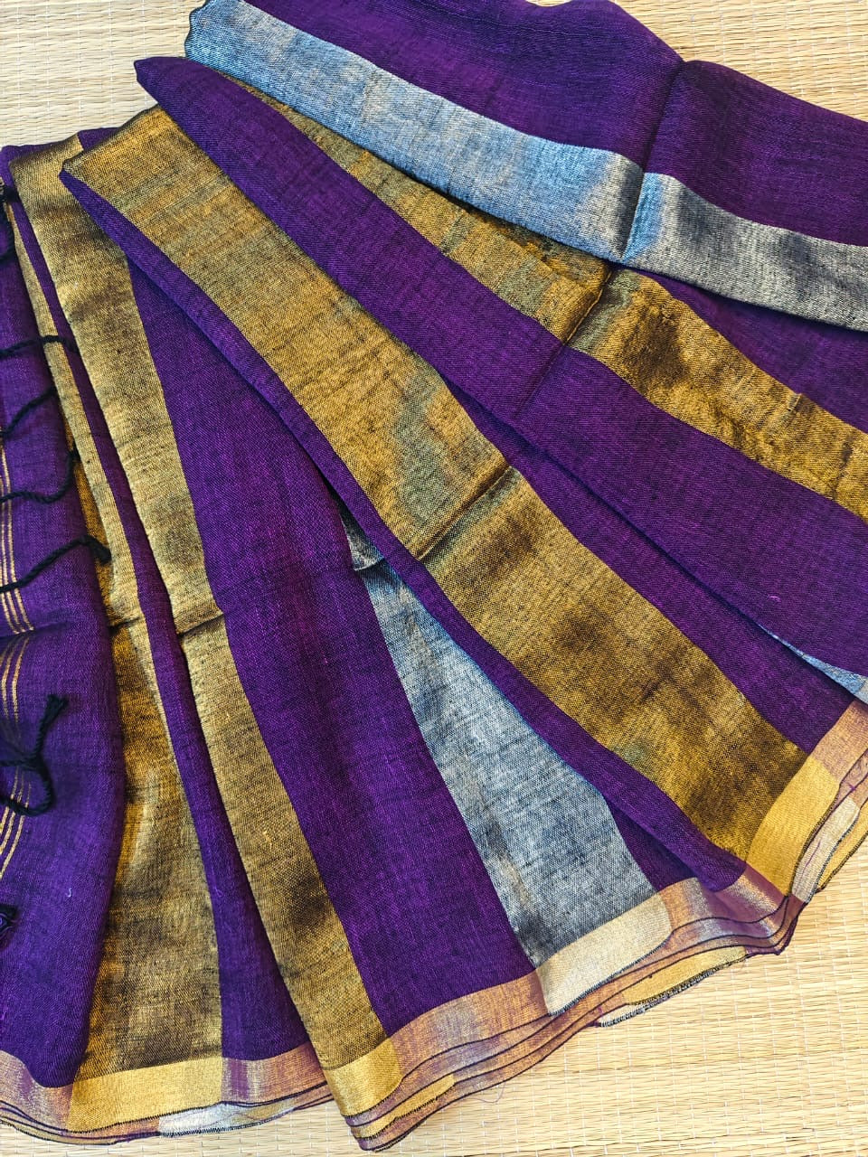 Linen sarees with gold silver zari stripes all over!