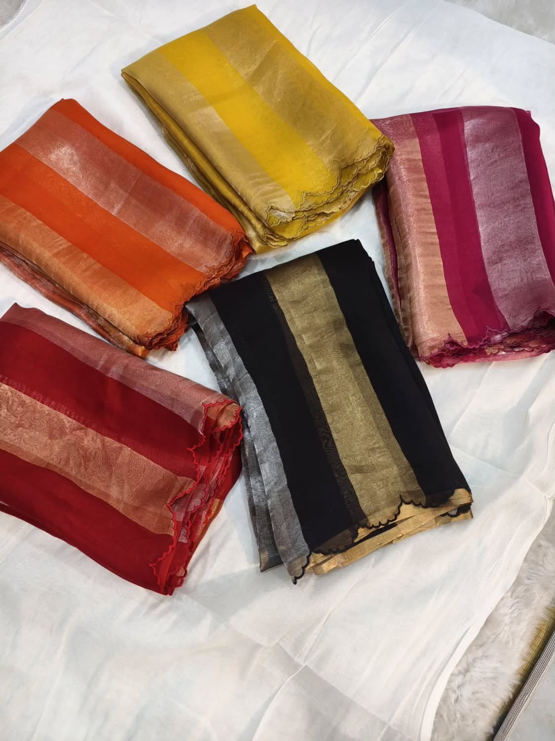 Beautiful georgette tissue silk saree with gold and silver tissue patta