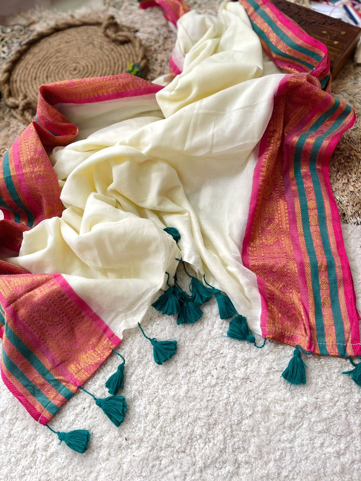 Premium pure mul cotton saree with pink and dark teal zari border
