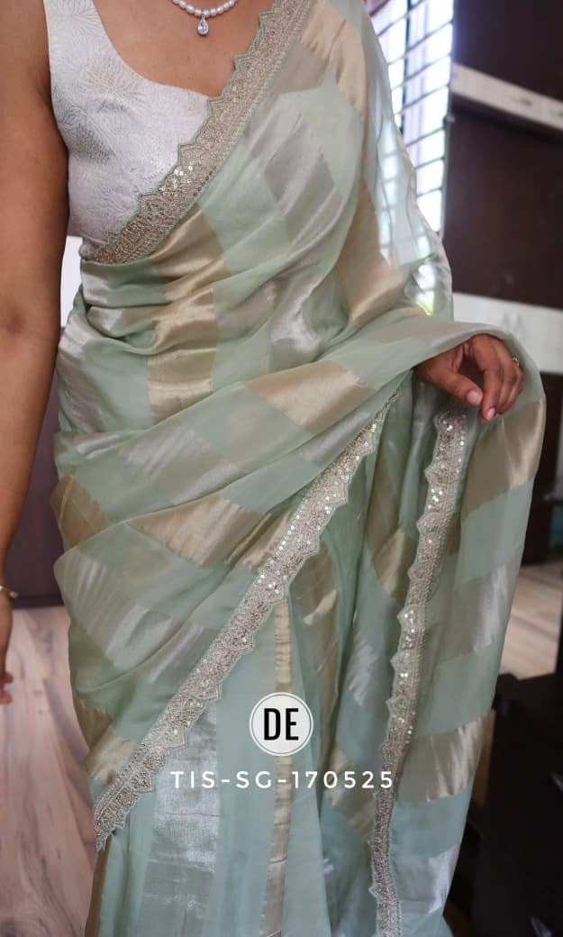 Pure organza tissue in silver and gold zari stripes saree
