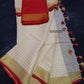Pure linen checks saree with contrast blouse