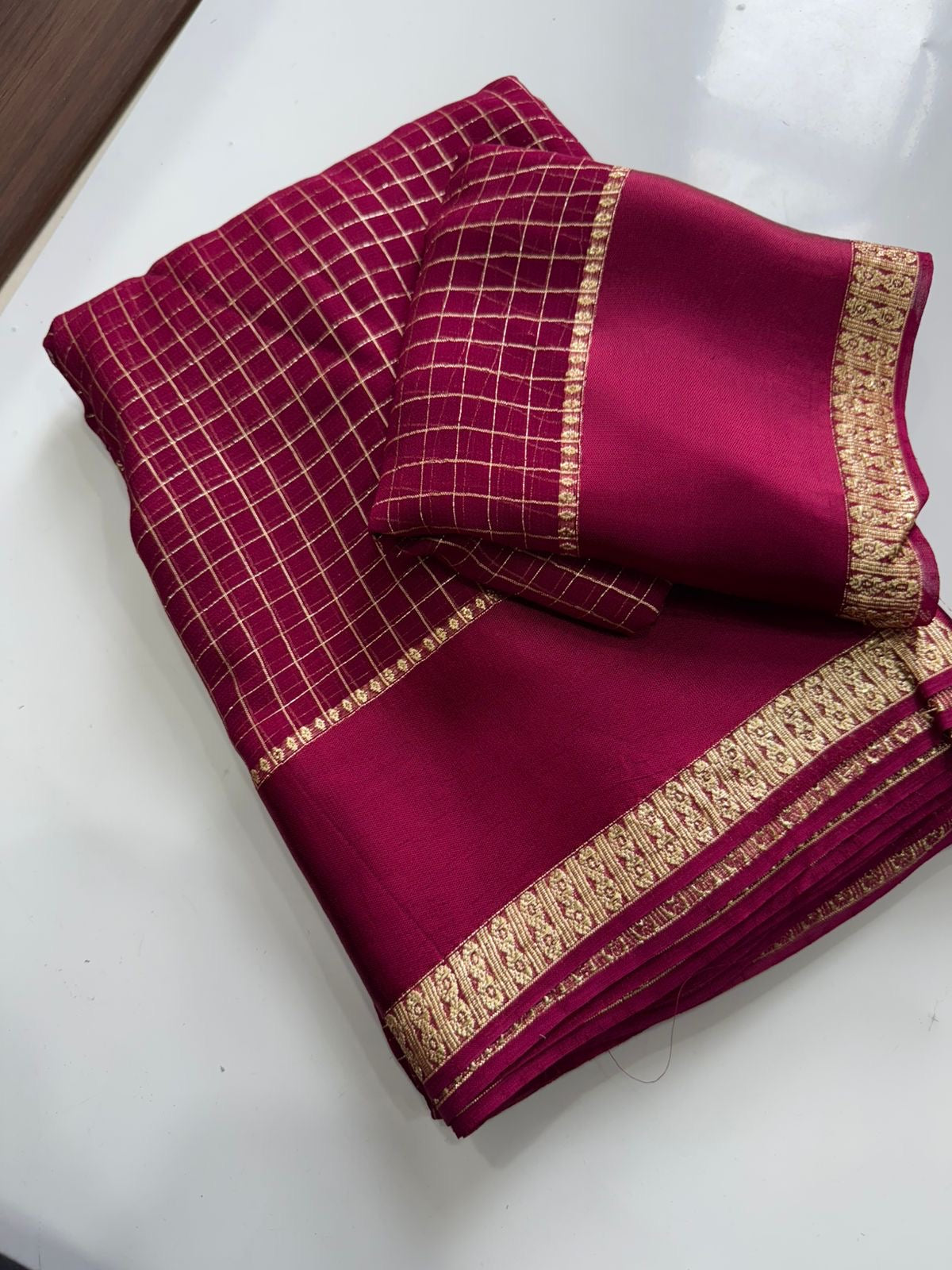Beautiful viscous georgette saree with checks body and running blouse