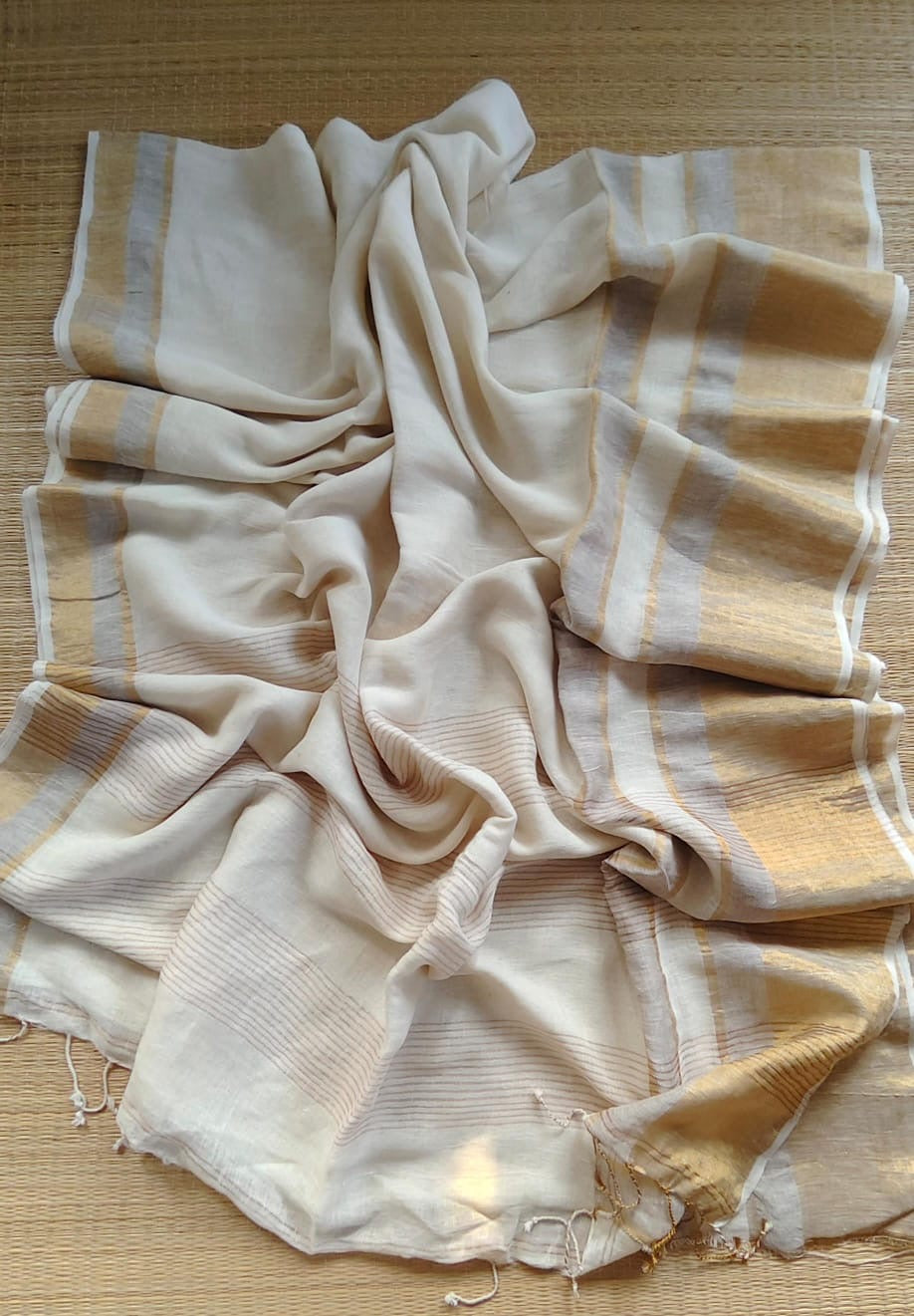 Pure handwoven linen saree with zari borders