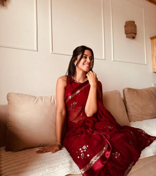 Viscous georgette saree with floral embroidery and satin border