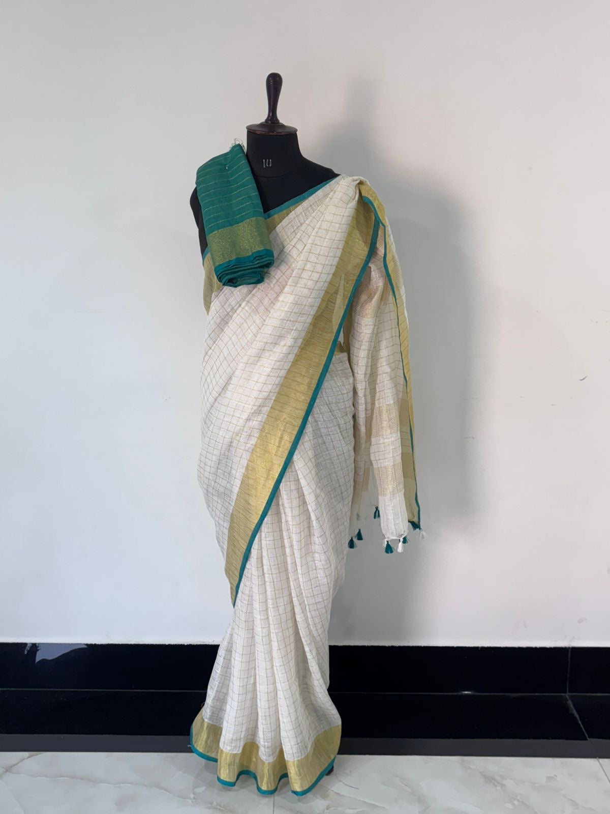 Pure linen checks saree with contrast blouse