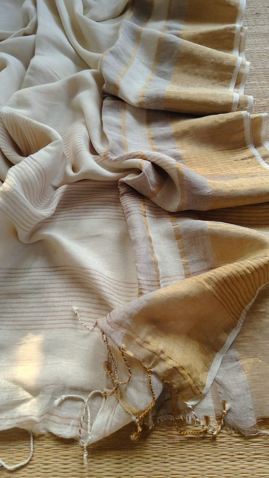 Pure handwoven linen saree with zari borders
