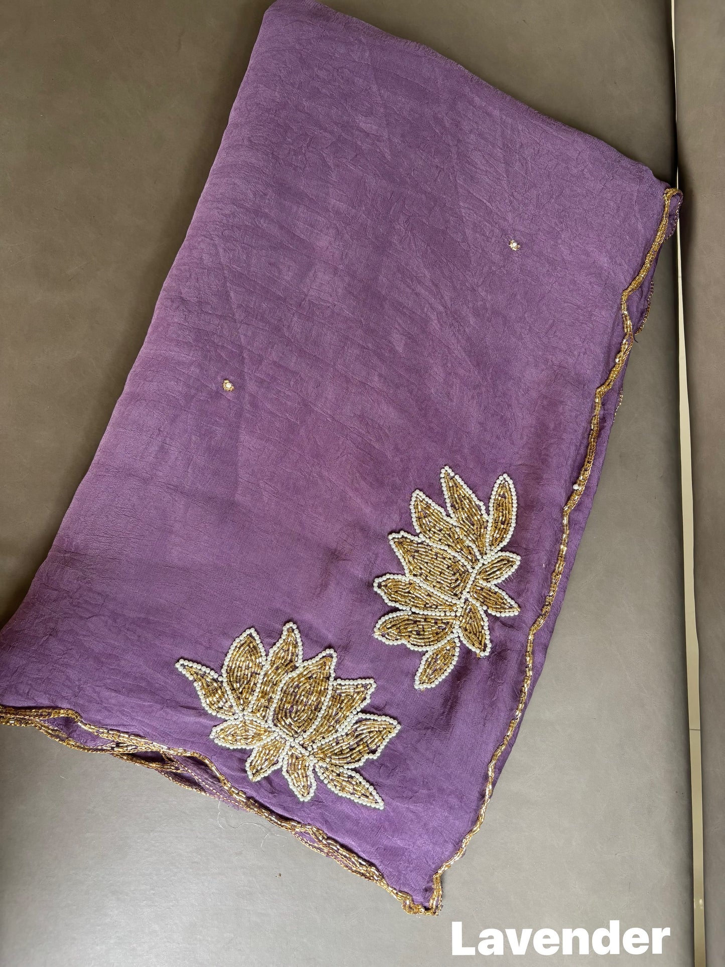 Soft crush rangoli saree with beautiful lotus handwork on pallu