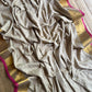Pure authentic Mul Cotton saree adorned with delicate gold polka dots and a rich zari border for timeless festive elegance.