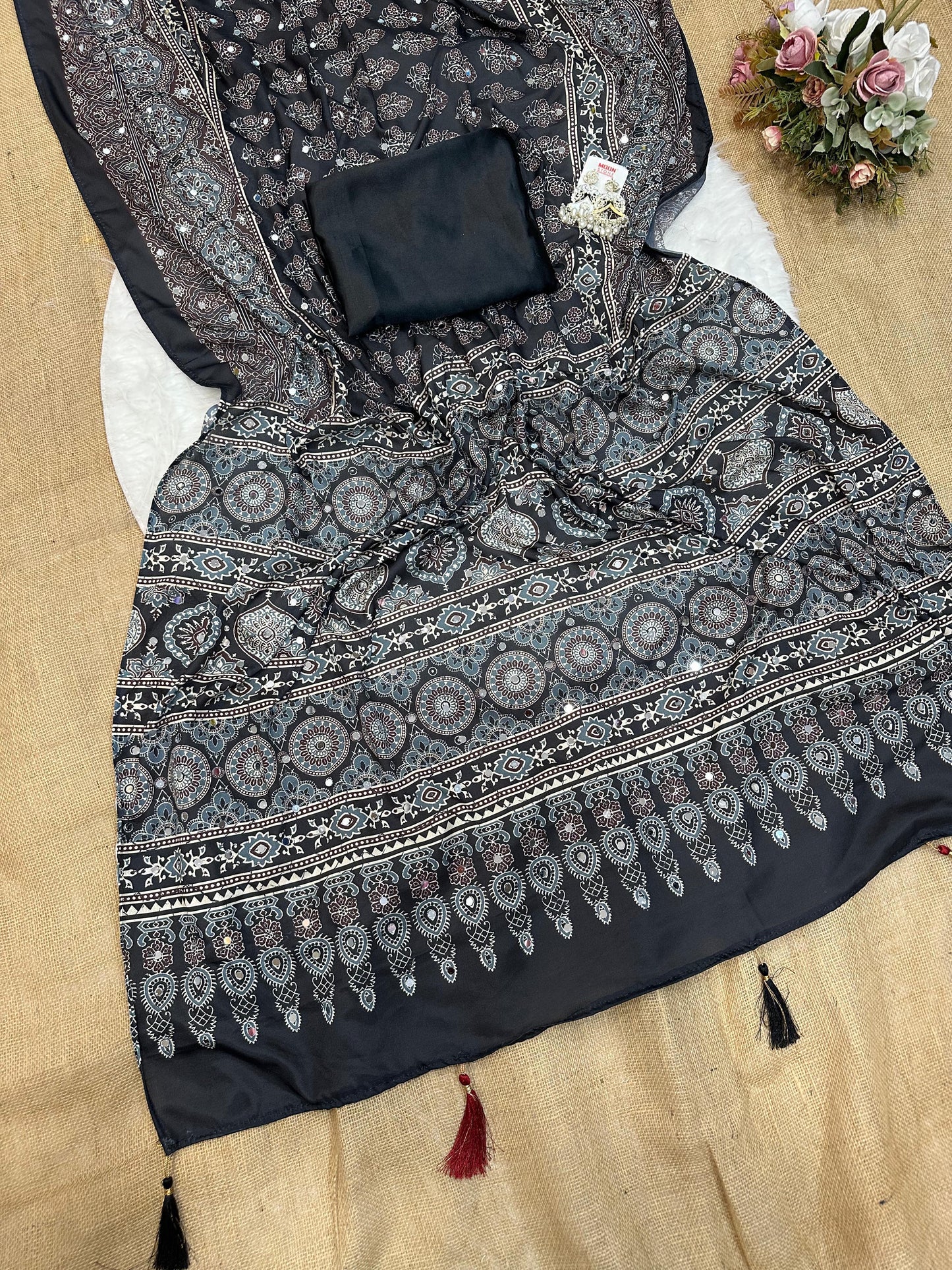 Beautiful semi crepe silk saree with ajrakh prints and mirror work