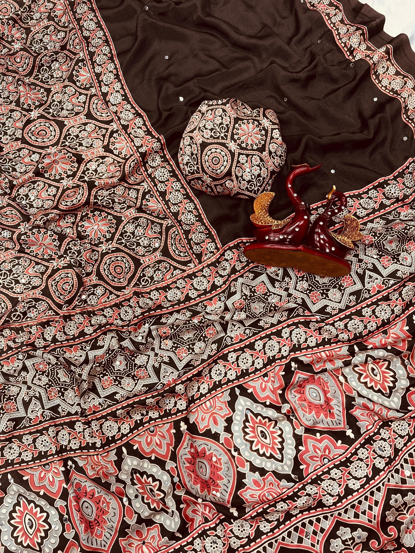 Soft and beautiful crepe silk saree with ajrakh prints and mirror work