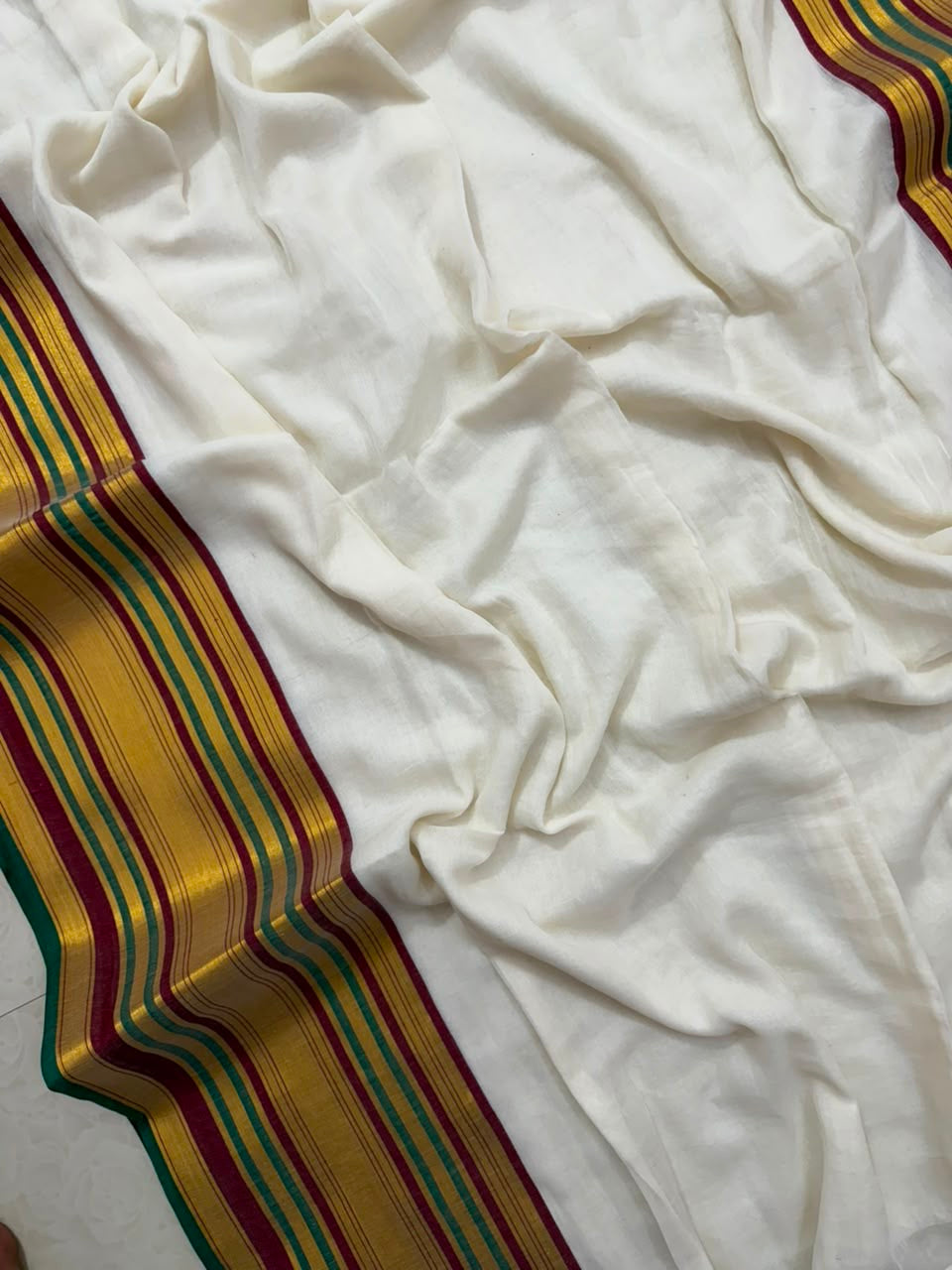 Pure and authentic soft mul cotton saree with maroon and green kanchi zari border