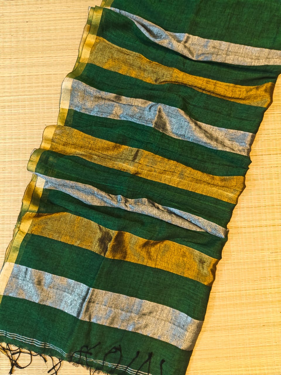 Linen sarees with gold silver zari stripes all over!