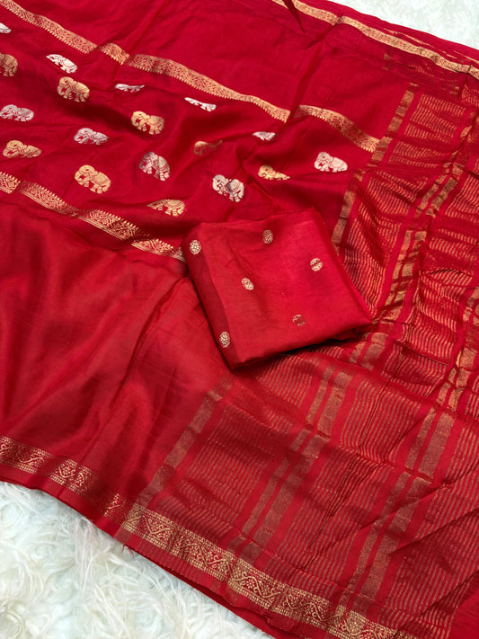 Soft viscous dola silk with beautiful silver and gold elephant motifs in the middle