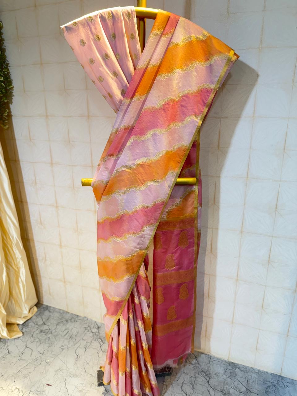 Semi katan organza saree with rangkot pattern