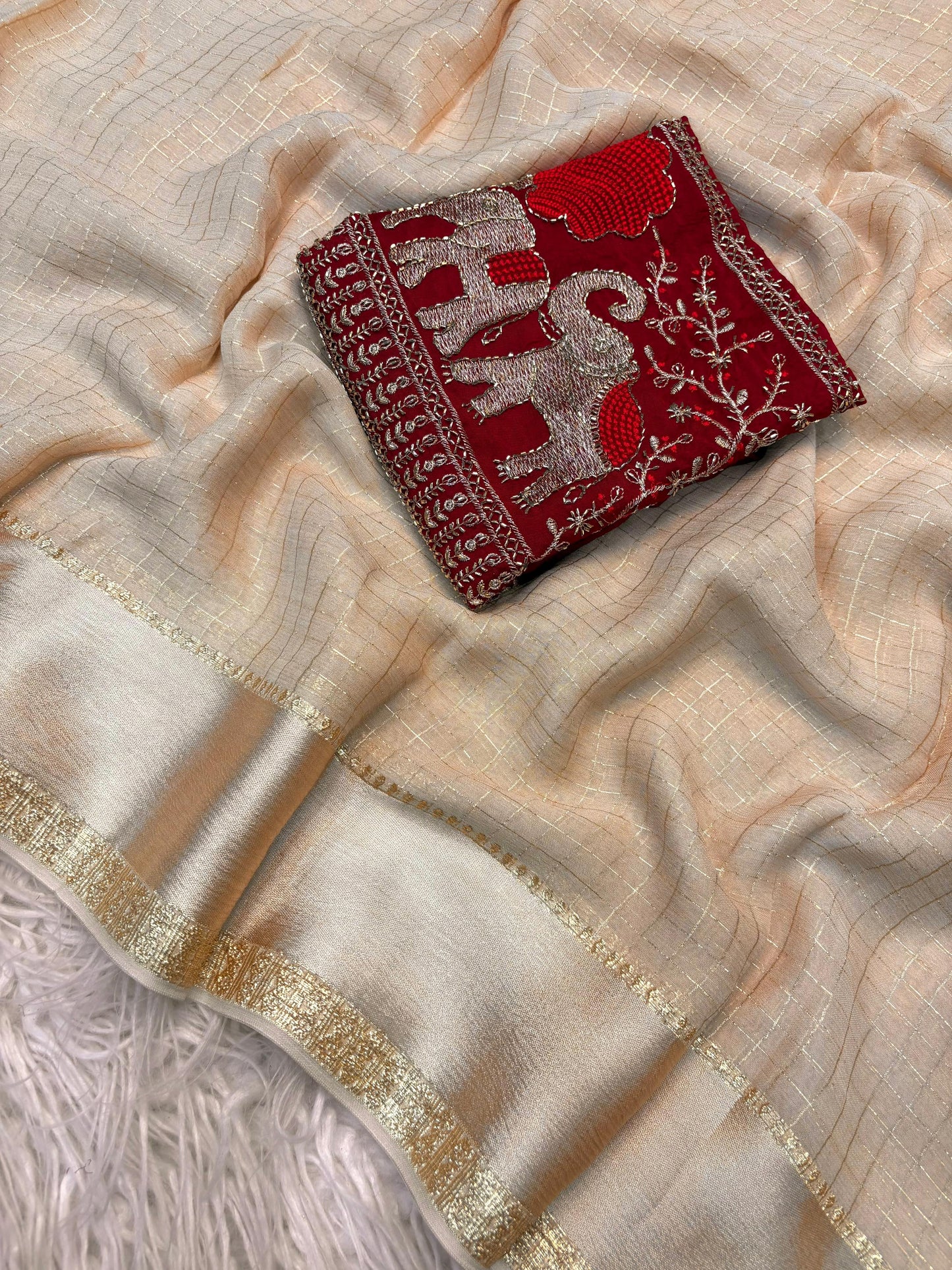 Beautiful viscous georgette checks saree in beige and red elephant blouse