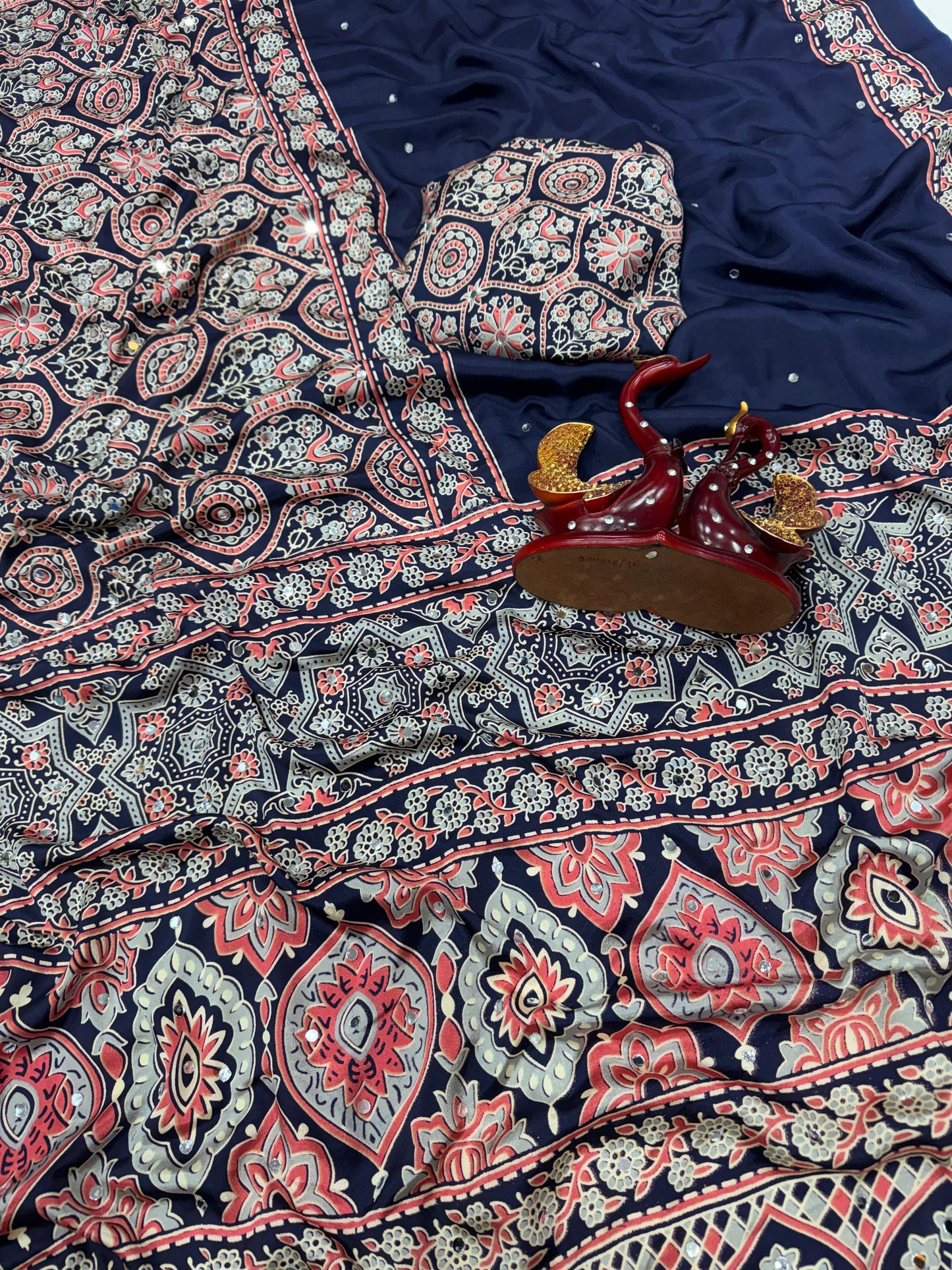 Soft and beautiful crepe silk saree with ajrakh prints and mirror work
