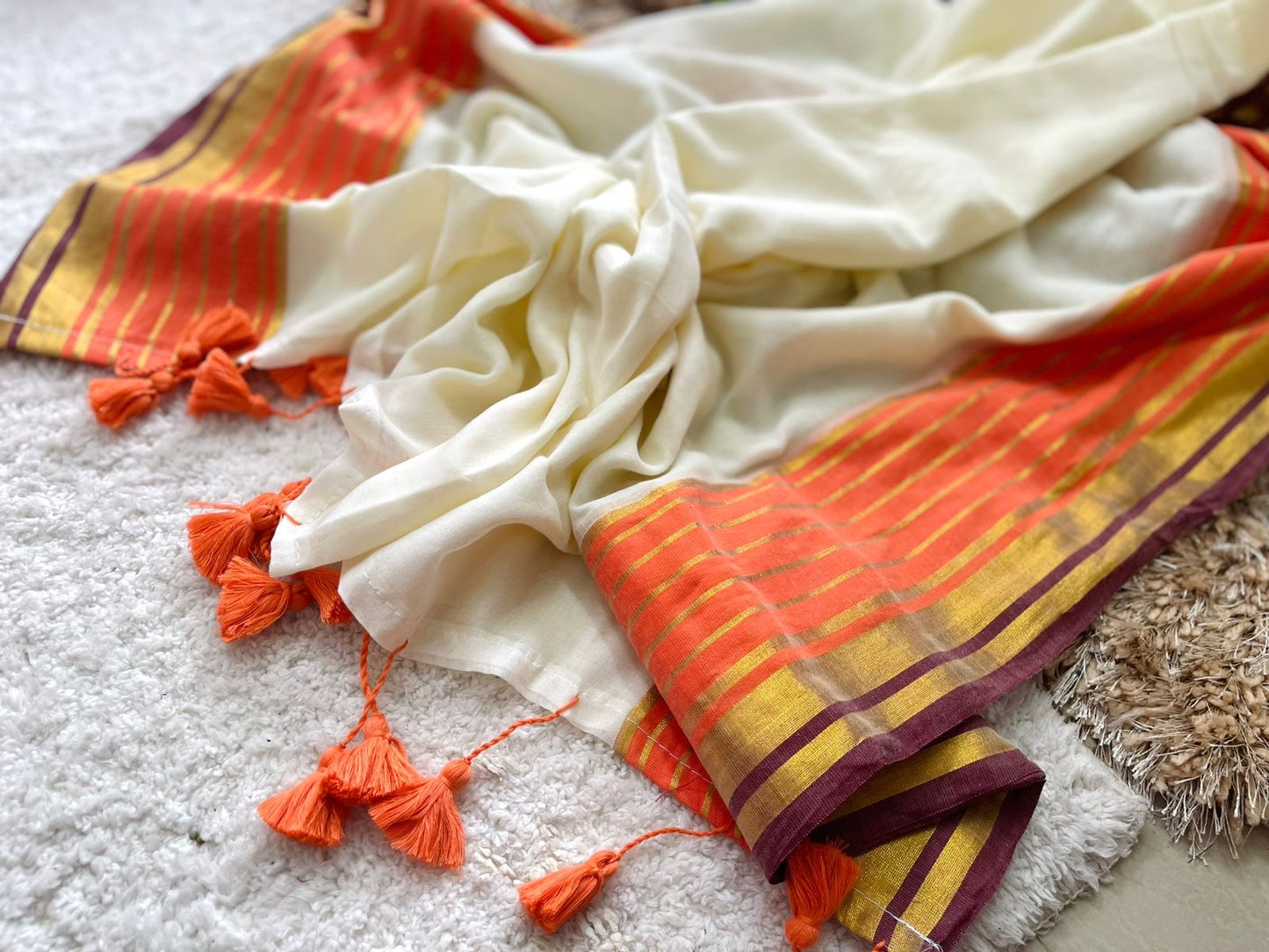 Premium pure mul cotton saree with orange and brown zari border