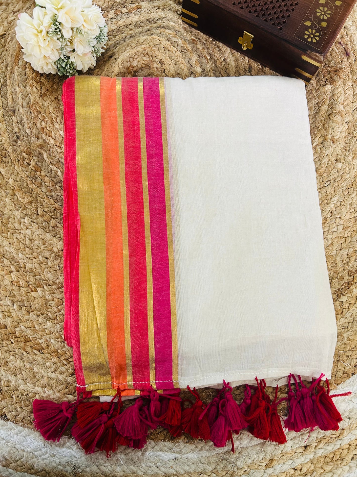 Pure and authentic mul cotton saree with multicolor zari border and beautiful tassels