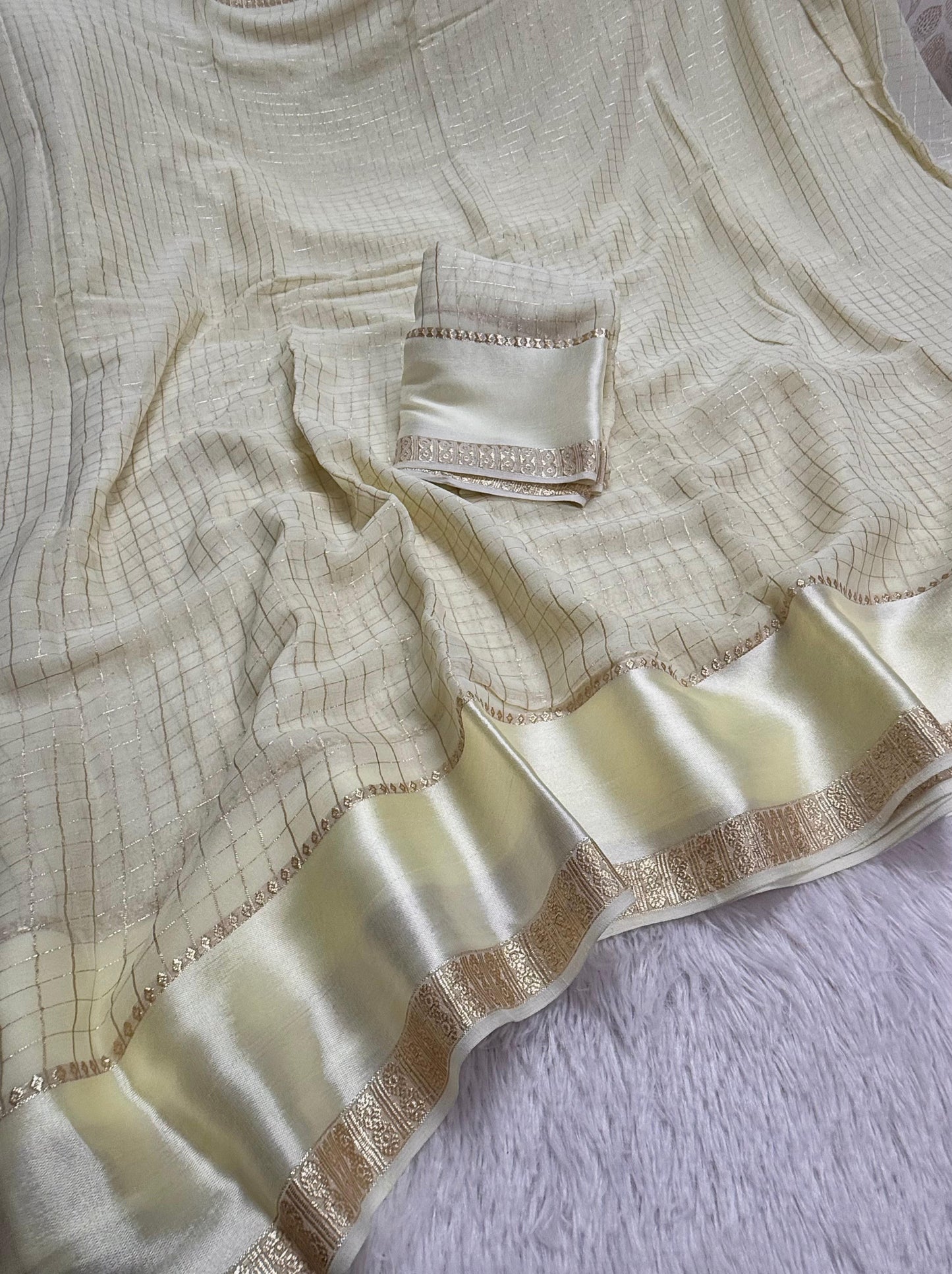 Soft viscous georgette saree with checks and satin border