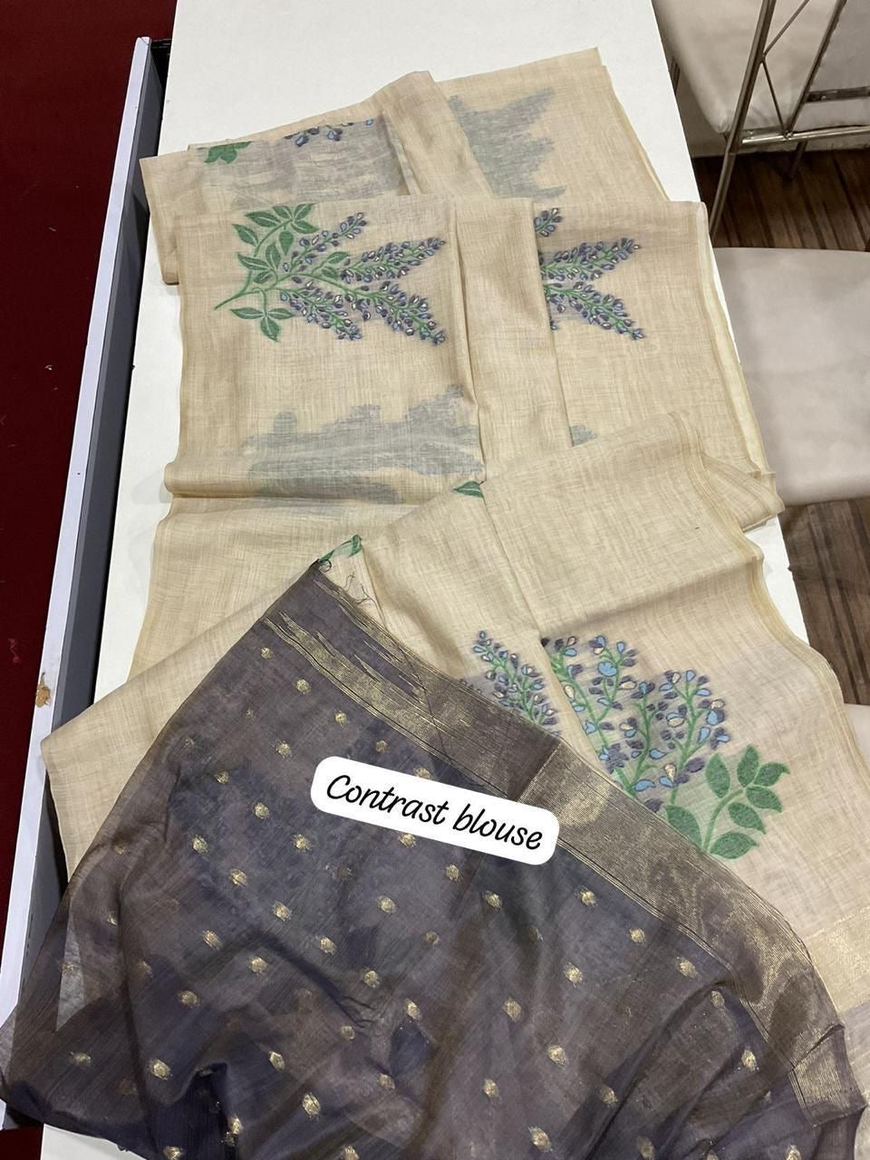 Soft off white muga cotton saree with floral weavings