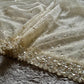 Pure tissue silk saree with pearl sequins handwork