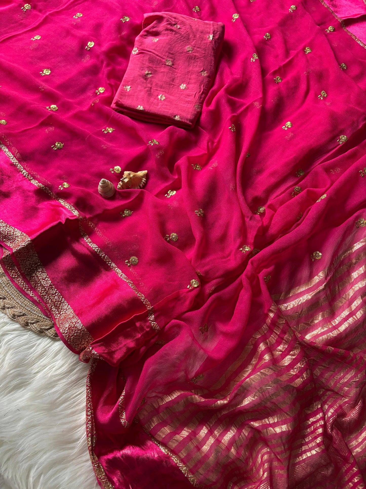 Pure georgette viscous saree with rich satin border and tiny flower buttas