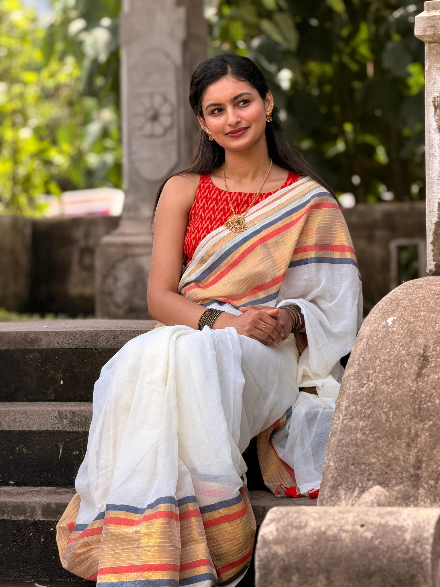 Soft mul cotton saree with beautiful red and black zari stripes border