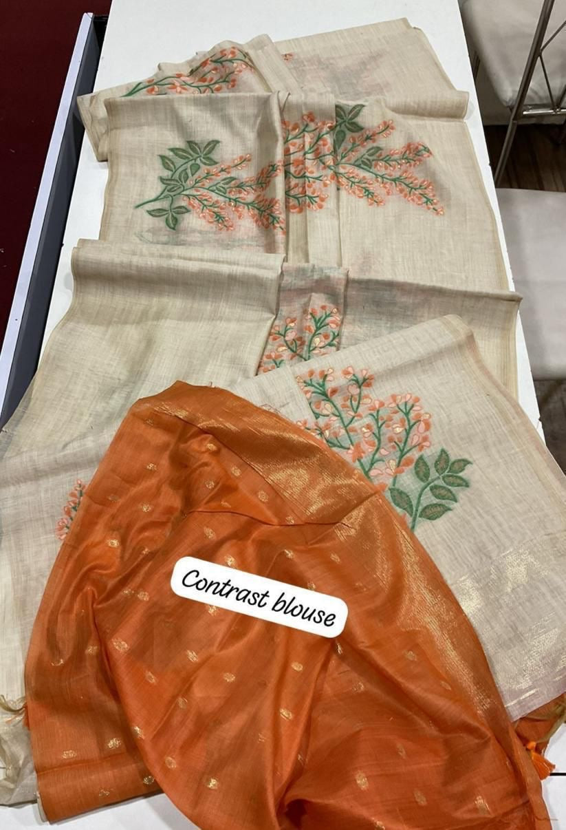 Soft off white muga cotton saree with floral weavings