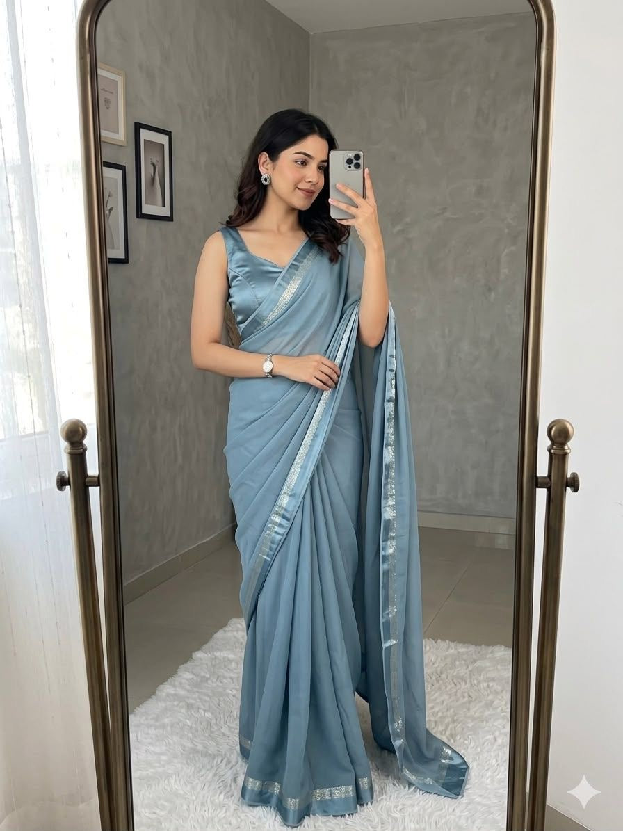 Beautiful viscous plain georgette saree with satin border and running blouse