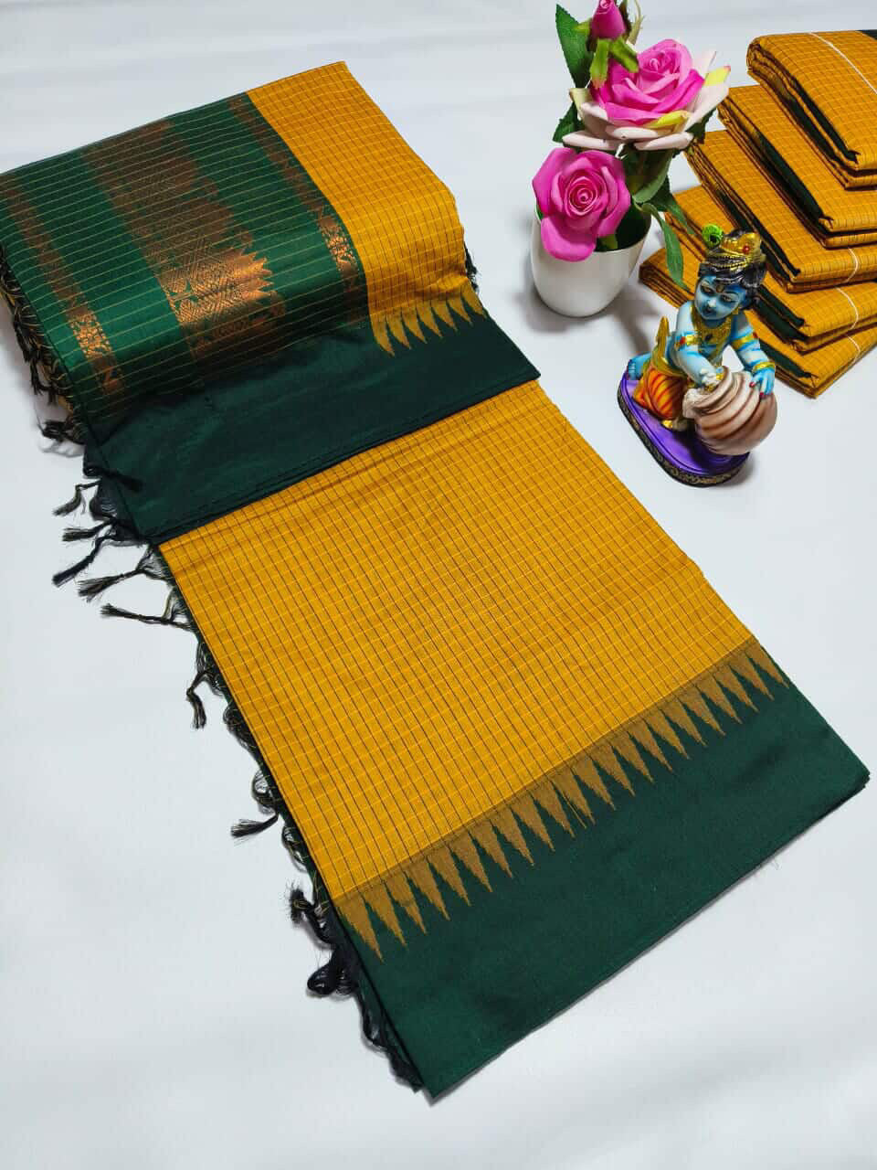 Gorgeous checked silk cotton sarees with solid temple border