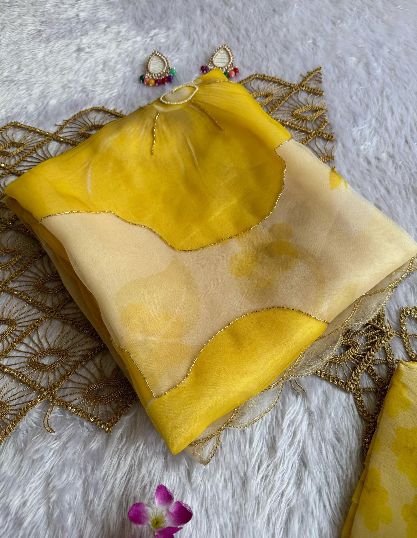 Soft semi organza saree with beautiful digital prints highlighted with beads work
