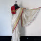 Pure linen checks saree with contrast blouse