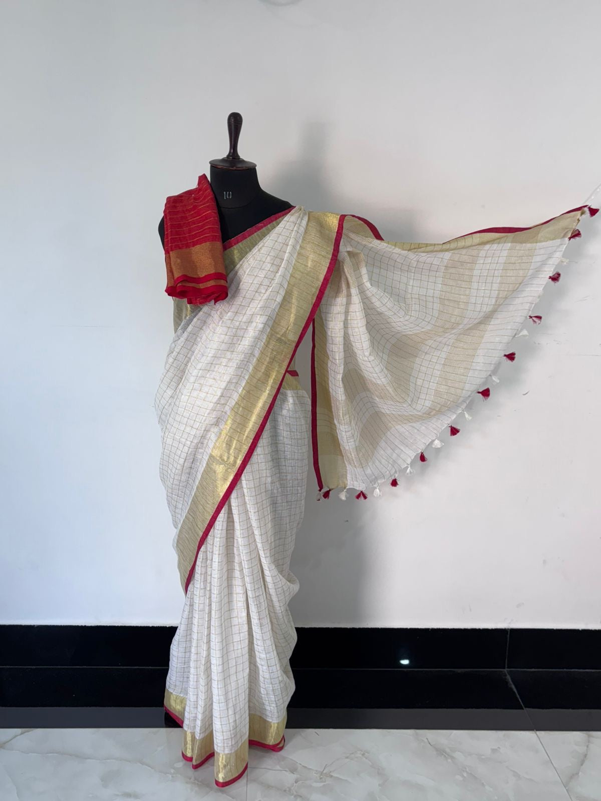 Pure linen checks saree with contrast blouse