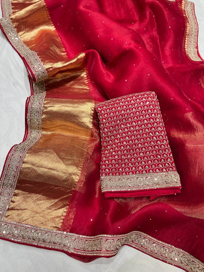Pure organza saree with kanchi zari border and heavy blouse
