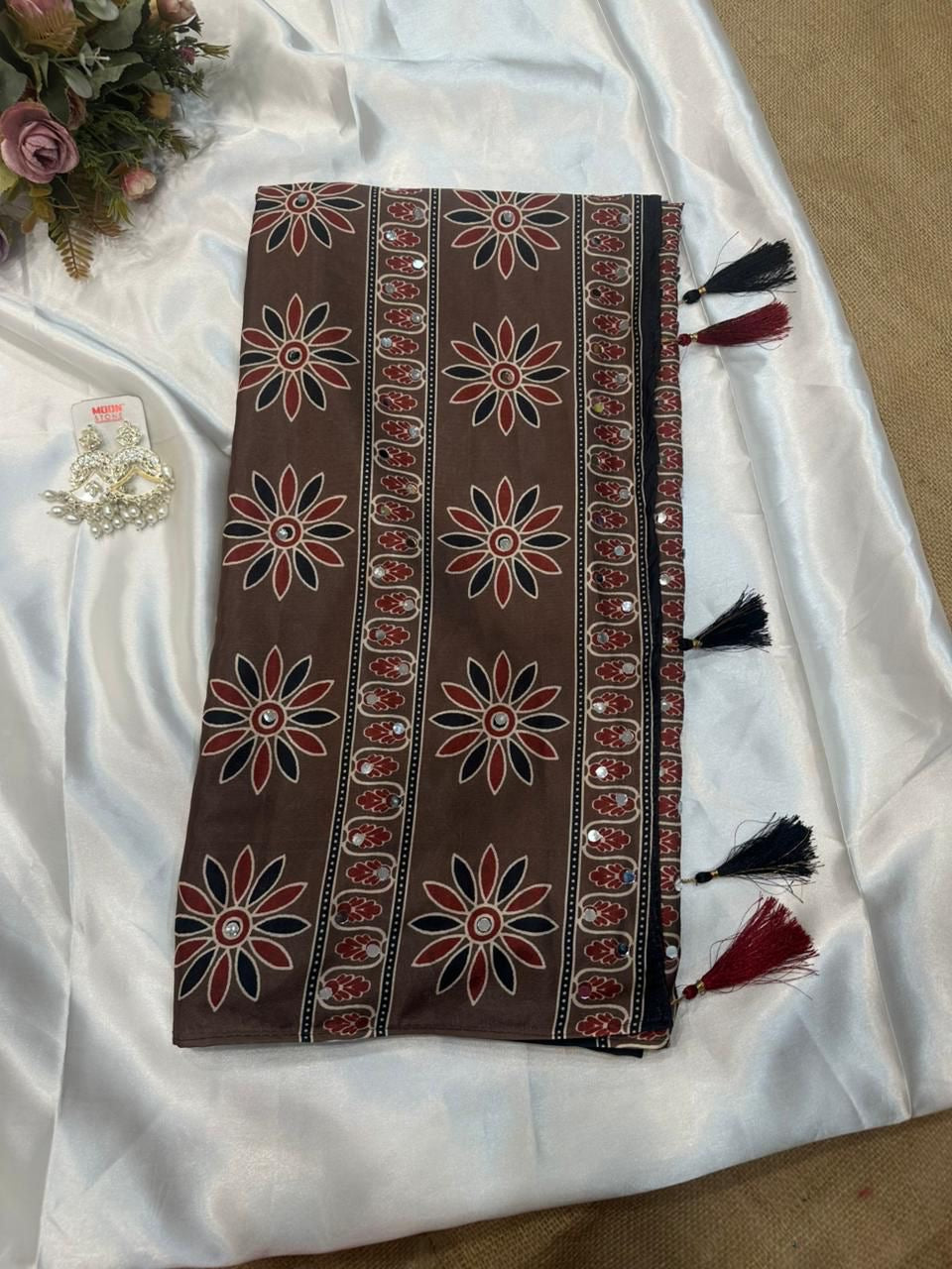 Beautiful semi crepe silk saree with ajrakh prints and mirror work