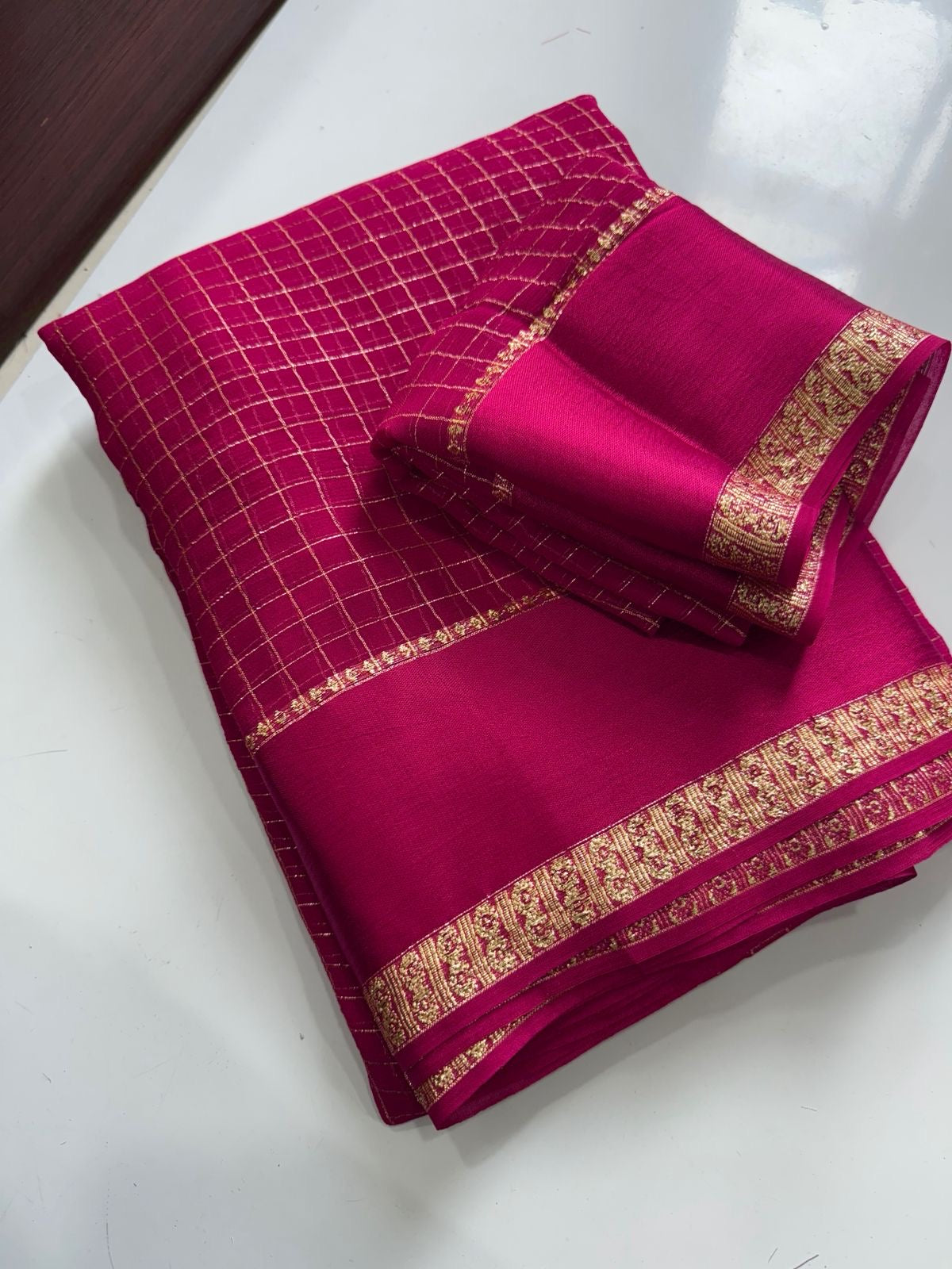 Beautiful viscous georgette saree with checks body and running blouse