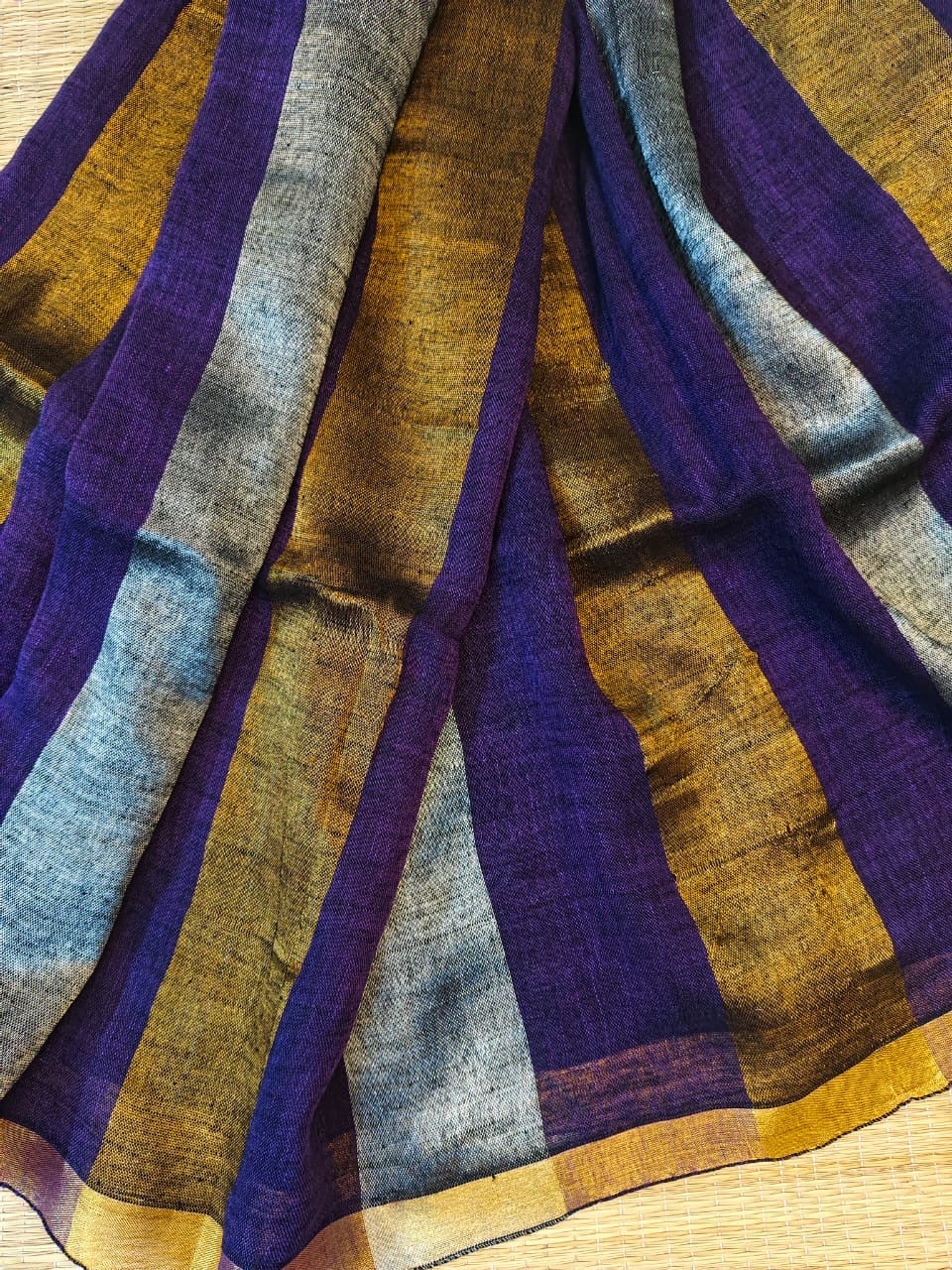 Linen sarees with gold silver zari stripes all over!