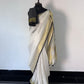 Pure linen checks saree with contrast blouse