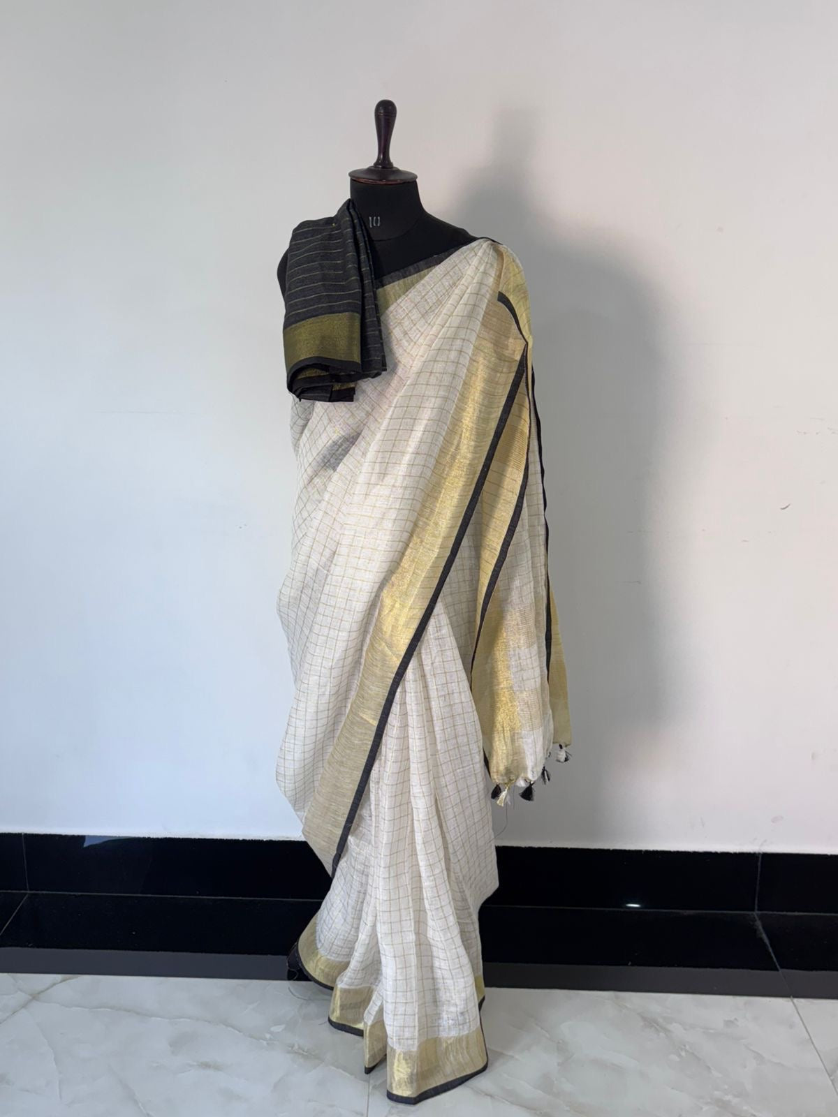 Pure linen checks saree with contrast blouse