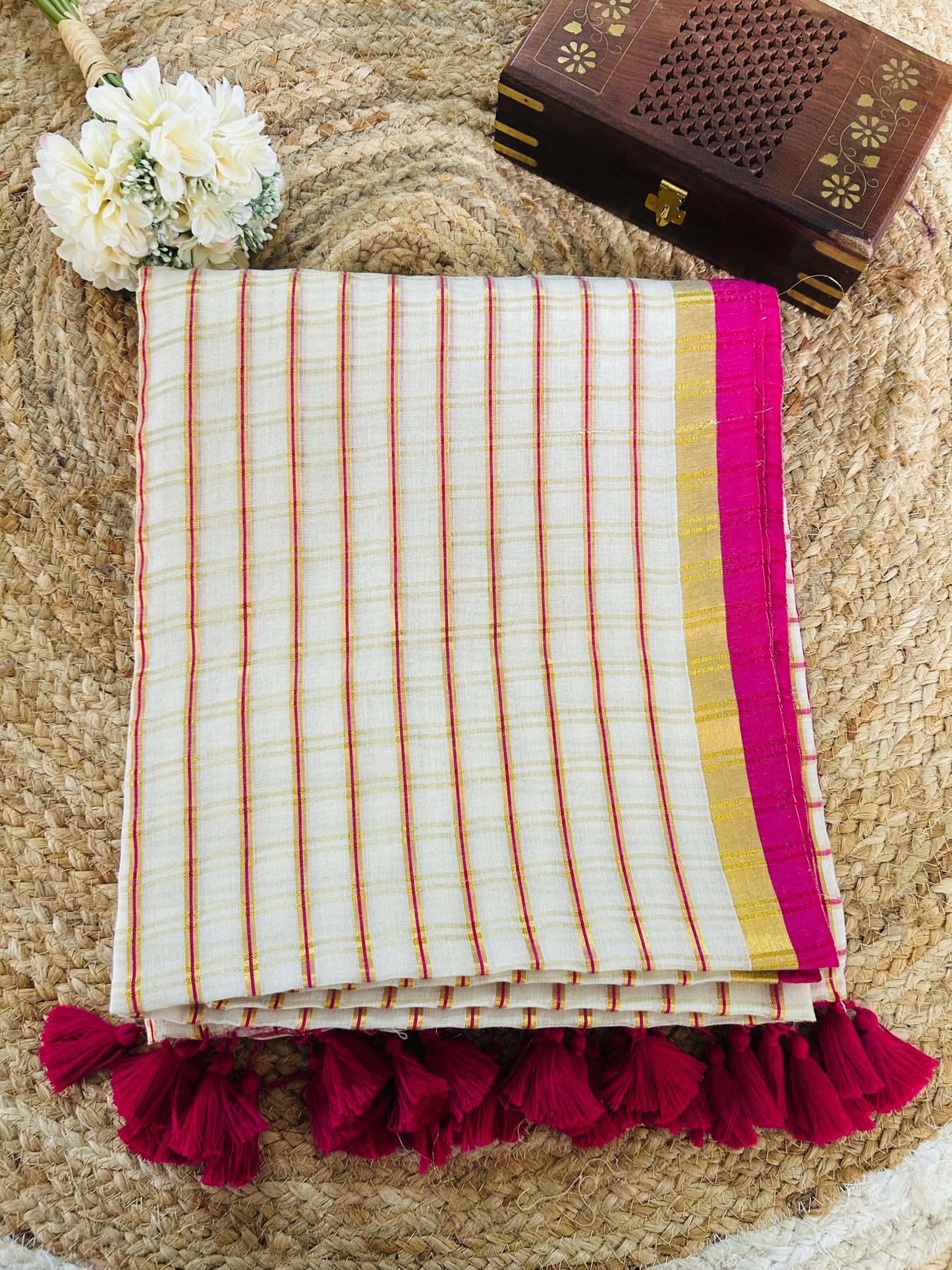 Pure and authentic mul cotton saree with pink zari checks and small border