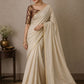Beautiful semi chanderi silk saree with gold zari checks paired with brown Banarasi brocade blouse