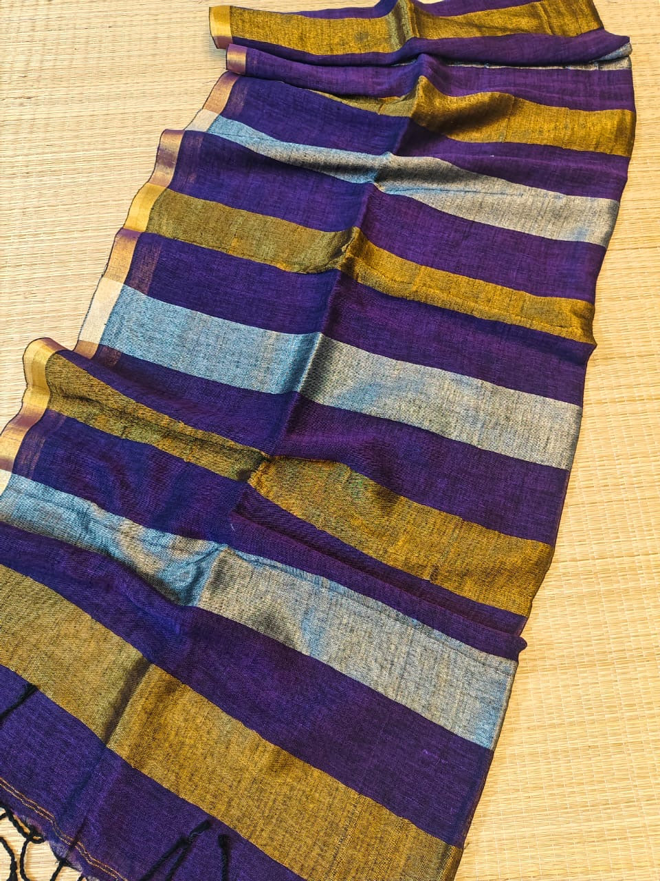 Linen sarees with gold silver zari stripes all over!