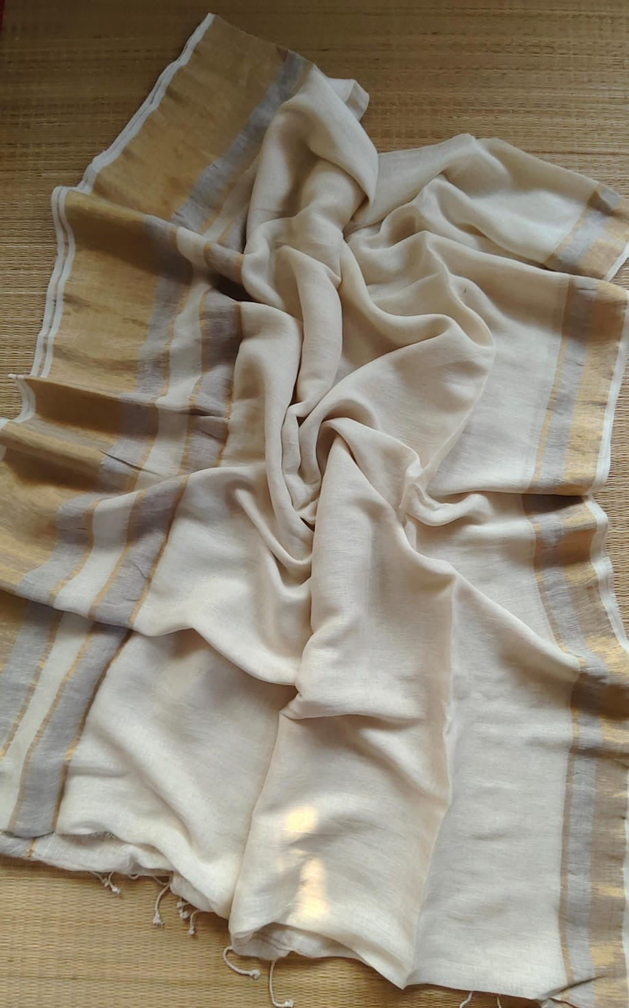 Pure handwoven linen saree with zari borders