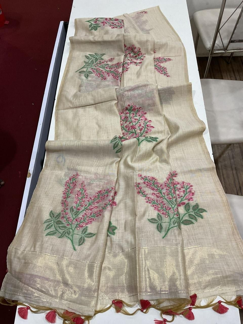 Soft off white muga cotton saree with floral weavings