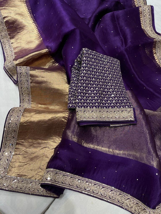 Pure organza saree with kanchi zari border and heavy blouse