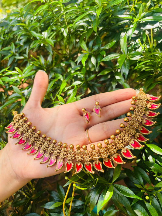 Antique Red Pulinakham Palakka Necklace Set – A timeless statement piece with an elegant antique finish and rich red detailing