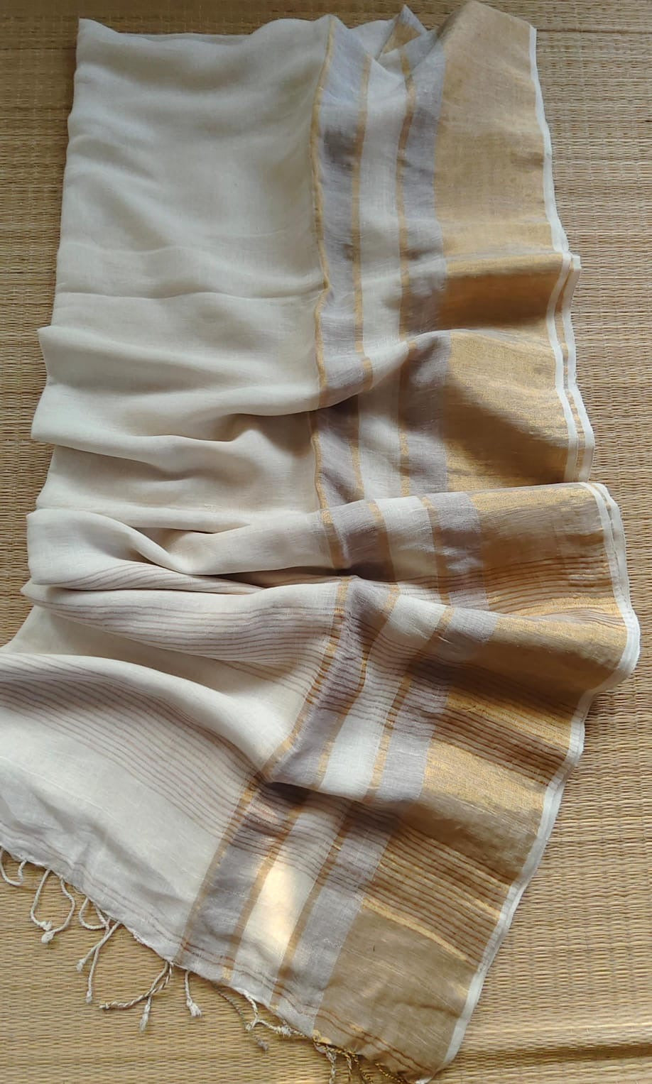 Pure handwoven linen saree with zari borders