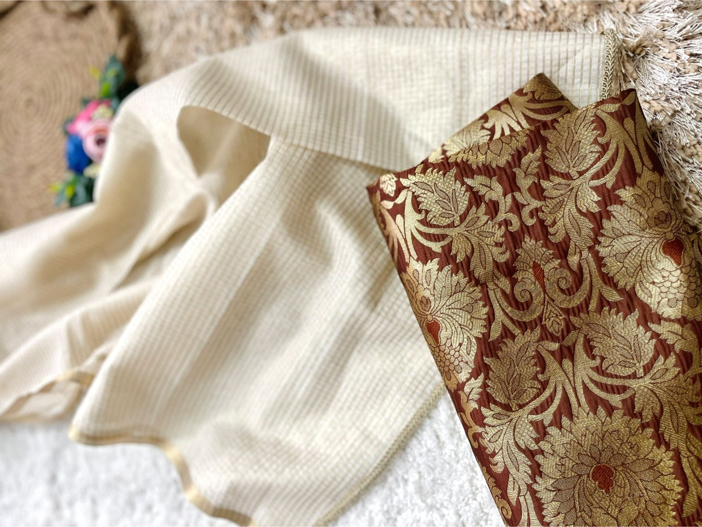 Beautiful semi chanderi silk saree with gold zari checks paired with brown Banarasi brocade blouse